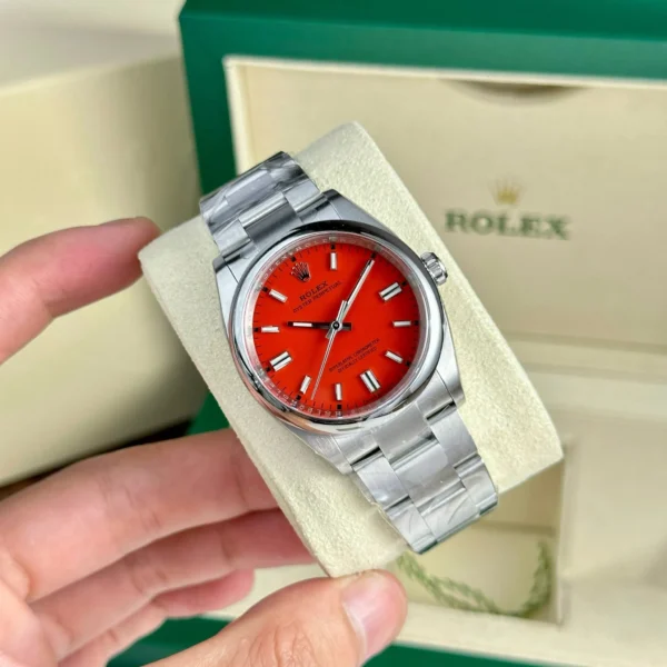 Alternative view of Replica Rolex Oyster Perpetual Lady Coral Red Dial 126000 36 mm