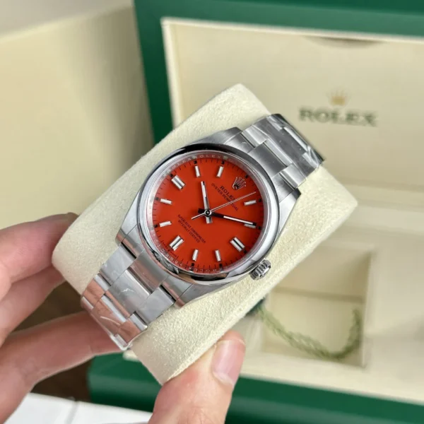 Alternative view of Replica Rolex Oyster Perpetual Coral Red Dial 124300 41 mm